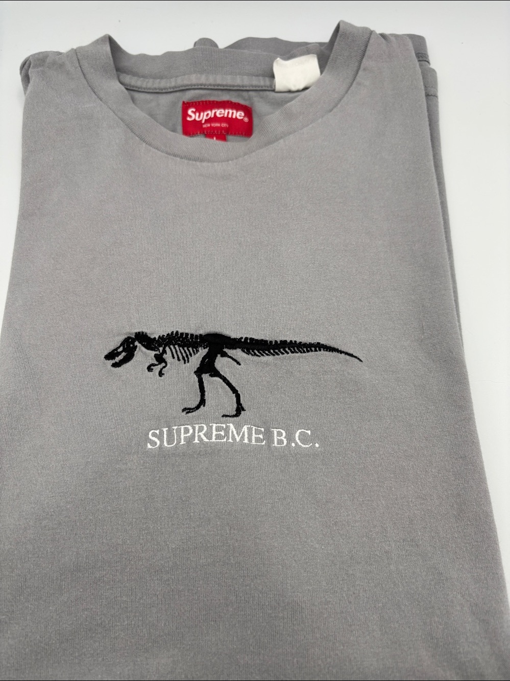 Supreme Embroidered Dinosaur Skeleton BC Top Mens L Size Grey Color T-Shirt